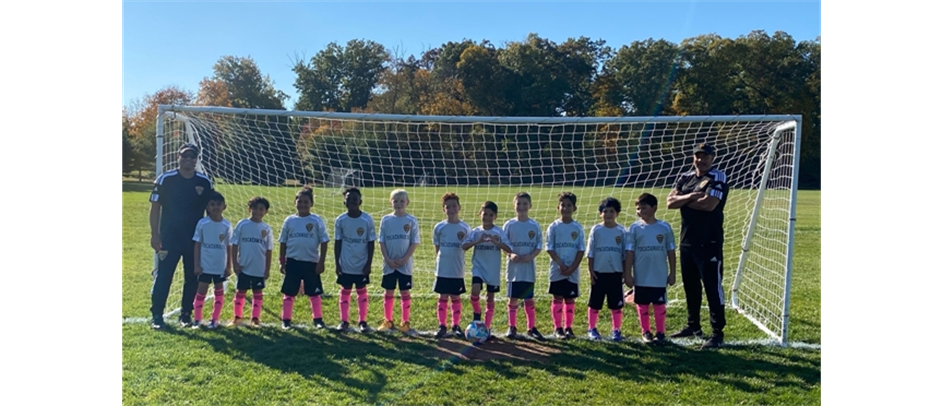 Arsenal wears pink socks for Breast Cancer Awareness Month
